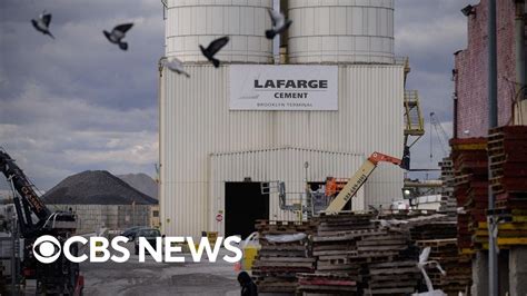 French cement company pleads guilty to supporting .